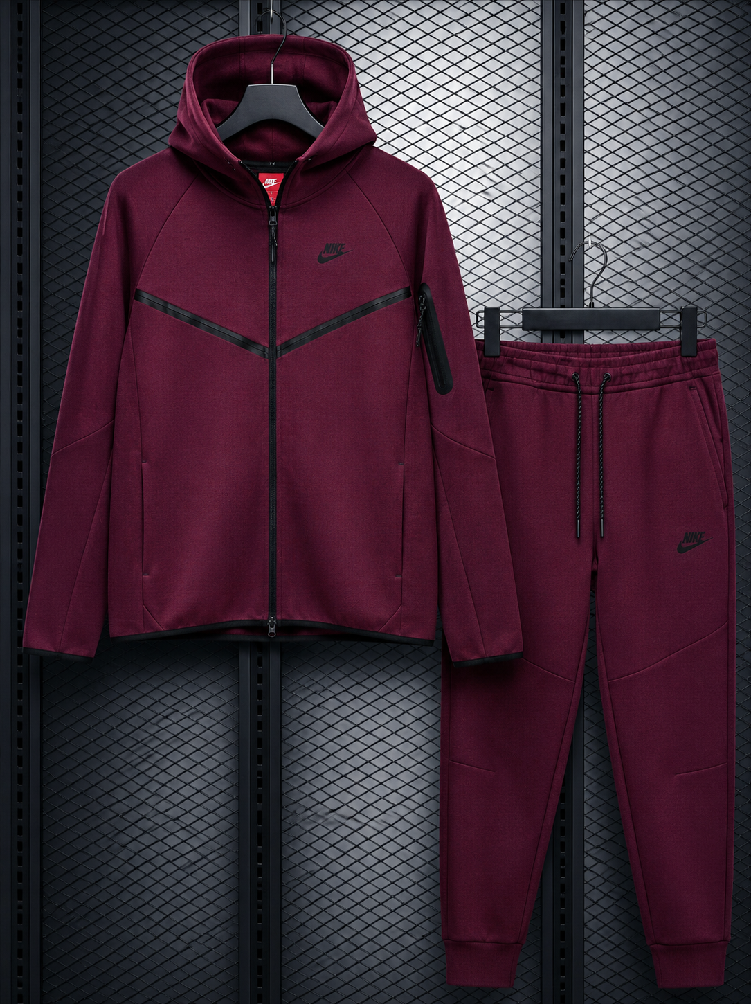 Nike burgundy tracksuit in studio setting
